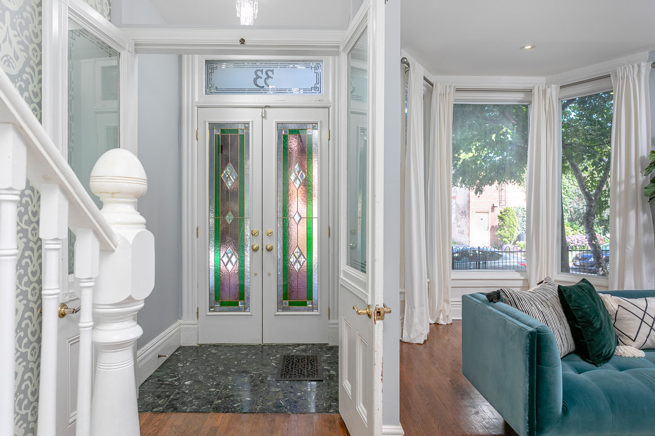 33 Prospect Street foyer with stain glass and bay window
